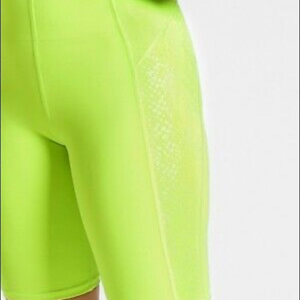 ‎Athleta Stay Fly Reflective Compression 9" Shorts - Picture 4 of 13